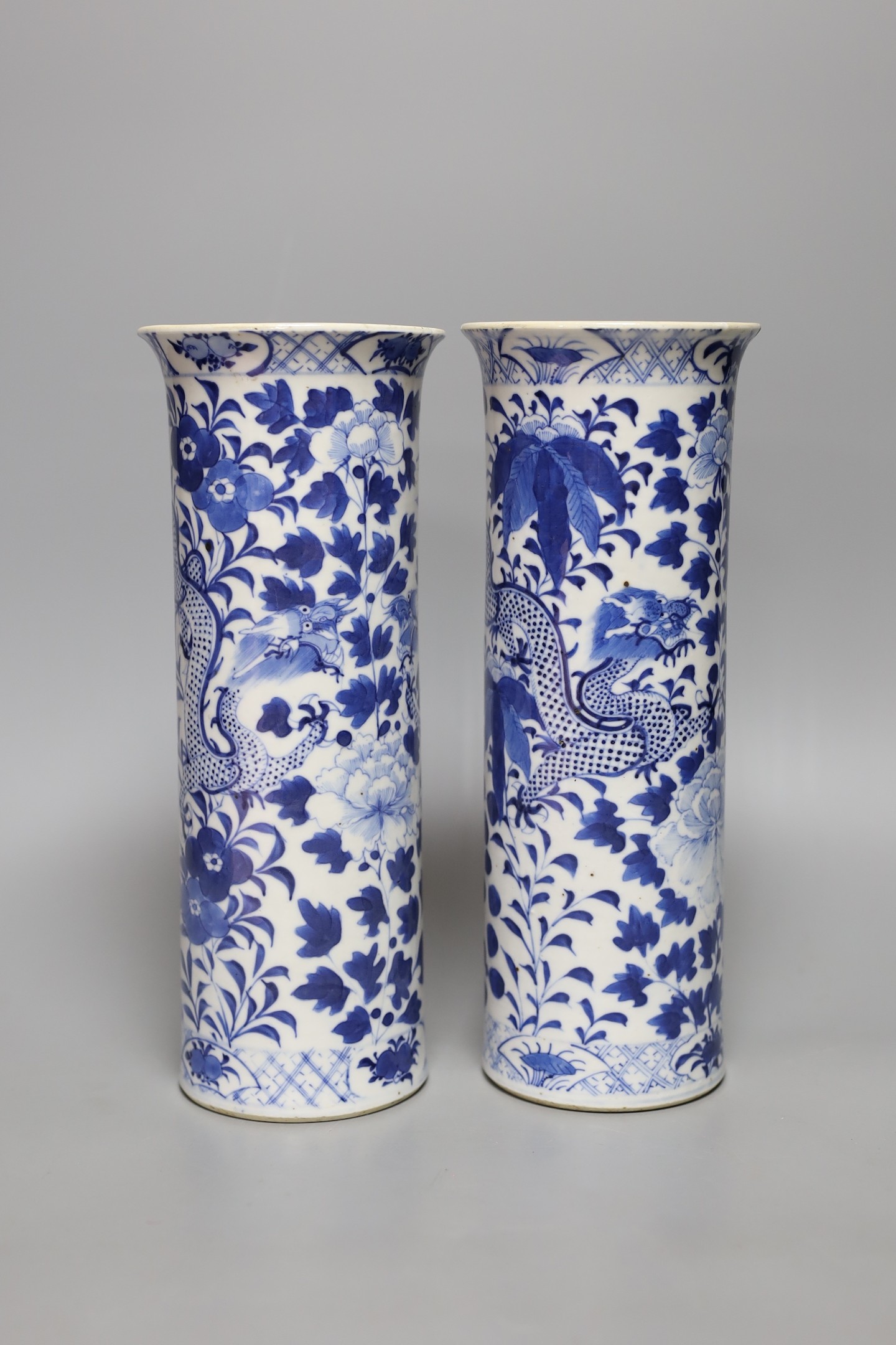 A pair of late 19th century Chinese porcelain sleeve vases, 26cm